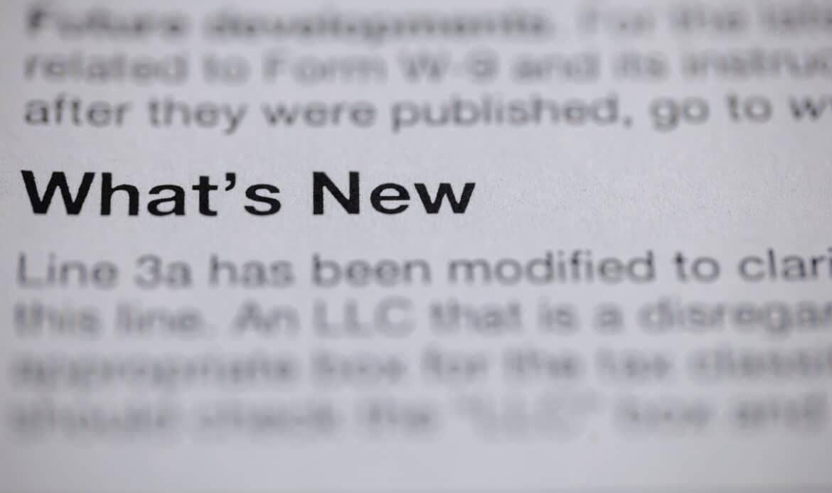 Close up of book text focused on the words "What's New" associated with New York real estate law updates in 2025.