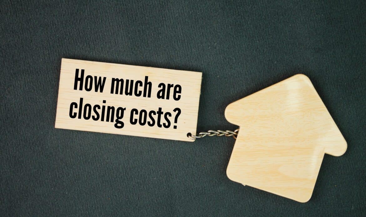Wood tag asking a common question related to residential closings in New York.